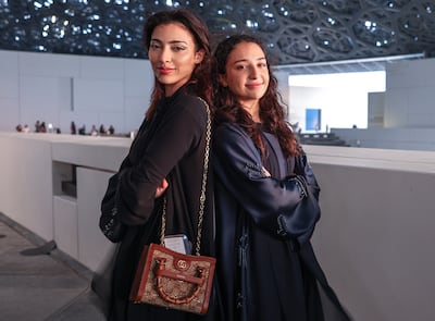 Emirati racing drivers Amna and Hamda Al Qubaisi at the Louvre Abu Dhabi. Victor Besa / The National