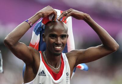 Mo Farah does the Mobot at his peak in London in 2012. Getty