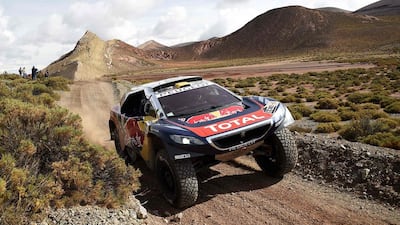 Peugeot driver Stephane Peterhansel and co-driver Jean Paul Cottret compete during the Stage 4 of the 2016 Dakar Rally around Jujuy, in Argentina. Franck Fife / AFP Photo