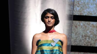 Clockwise from top: Manish Malhotra, left, with his showstoppers, Arjun Kapoor and Jacqueline Fernandez, centre; an outfit from Goan designer Wendell Rodricks’s Indica Emporia collection; an ensemble by the Berlin-based label ElektroCouture; and actor Sanjay Dutt attended Masaba Gupta’s show at Lakmé Fashion Week. Sujit Jaiswal / AFP; courtesy Lakme Fashion Week; Divyakant Solanki / EPA