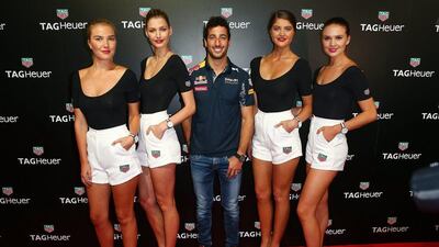Red Bull F1 driver Daniel Ricciardo poses with models at the TAG Heuer Grand Prix Party at Luminare on March 15, 2016 in Melbourne, Australia. (Photo by Scott Barbour/Getty Images)