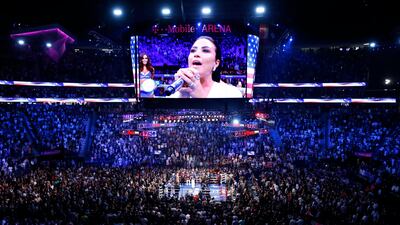 Demi Lovato sings the National Anthem. AP