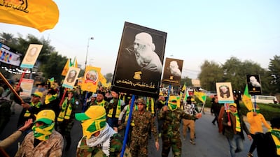 Members of the Kataib Hezbollah group gather ahead of the funeral of Iraqi militia commander Abu Mahdi Al Muhandis, who was killed in an air strike at Baghdad International Airport, Iraq, on January 4, 2020. Reuters / Thaier al-Sudani