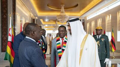 Sheikh Mohamed bin Zayed, Crown Prince of Abu Dhabi and Deputy Supreme Commander of the UAE Armed Forces, with Emmerson Mnangagwa, President of Zimbabwe meet the delegates from Zimbabwe. Ryan Carter for the Ministry of Presidential Affairs