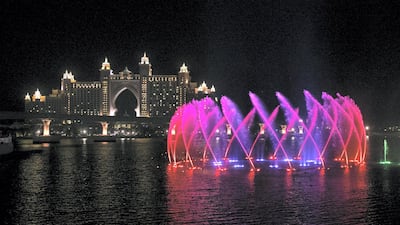 The Palm Fountain comes alive for Oman's National Day. Reem Mohammed / The National