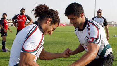 Cyrus Homayoun, right, returns to the UAE senior side.