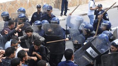 Thousands of students march in Algeria's capital to demand the resignation of the education minister in April 2011. Anis Belghoul / AP