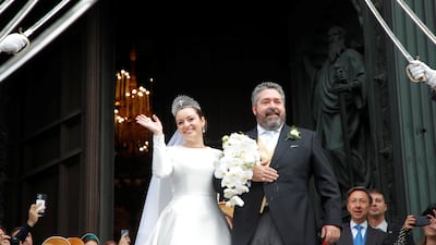 Grand Duke George Mikhailovich Romanov and Victoria Romanovna Bettarini leave St Isaac's Cathedral after their wedding ceremony in Saint Petersburg, Russia. Photos: Reuters and AFP