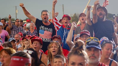 People cheer at a Maga rally in Sarasota, Florida. AFP