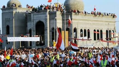 Pro-reform activists gather in the village of Hajer north of Manama on Saturday. The solemn act of defiance was a pointed reminder that seven months after Bahrain ended mass demonstrations, dissatisfaction still flickers.