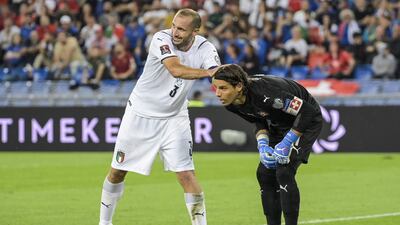 Italy's Giorgio Chiellini, left, congratulates Switzerland's goalkeeper Yann Sommer for a save. EPA
