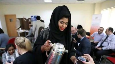 Mona Ali Mohammed, a student of National Institute for Vocational Education, serving the students and judges during the British Council Skills for Employability Programme in Dubai.