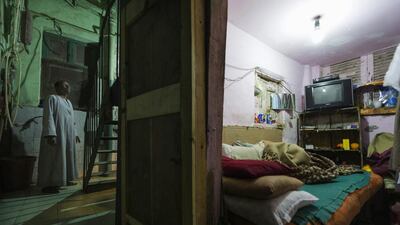 Salama waits for water to be boiled to make tea before going to bed. He has two holidays a year.