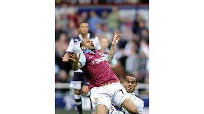 West Ham’s Kieron Dyer, top, has played just over 20 games in four years at Upton Park. Paul Hackett / Reuters