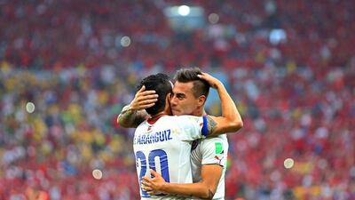 Charles Aranguiz, left, and Eduardo Vargas, right, celebrate after Vargas' goal on Wednesday night to make it 1-0 in Chile's 2-0 victory over Spain in the 2014 World Cup at the Maracana in Rio de Janeiro, Brazil. Oliver Weiken / EPA / June 18, 2014