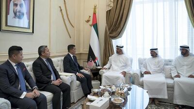 Sheikh Mohamed bin Zayed meets with Dato' Seri Mohamed Azmin bin Ali, Minister of Economic Affairs of Malaysia (4th R), during a Sea Palace barza. Seen with Mohamed Al Mazrouei, Undersecretary of the Crown Prince Court of Abu Dhabi (R) and Suhail Al Mazrouei, UAE Minister of Energy (2nd R). Hamad Al Kaabi / Ministry of Presidential Affairs