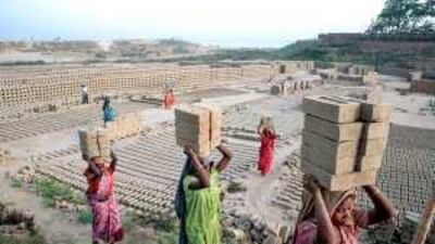 Women work at a brick kiln in Digha village in Bihar, which is one of India's worst performing regions in the jobs programme.