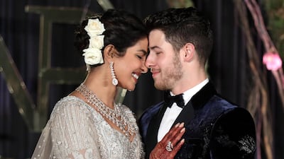 Priyanka Chopra and Nick Jonas pose during their wedding reception in New Delhi, India, on December 4, 2018. EPA