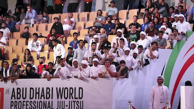 Spectators watch as the action unfolds at the Abu Dhabi World Professional Jiu-Jitsu Championship at Mubadala Arena in Abu Dhabi on Monday. All Photos by Pawan Singh / The National