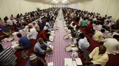Thousands broke their fast in iftar tents at Sheikh Zayed Grand Mosque in Abu Dhabi on the first day of Ramadan. Pawan Singh / The National