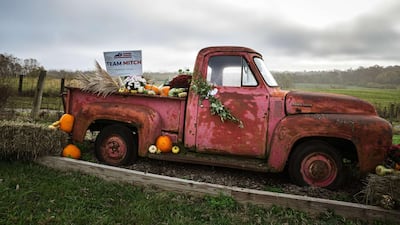 -A truck adorned with decorations and a Mitch McConnell sign sits outside of the venue where U.S. Senate Majority Leader Sen. Mitch McConnell, makes a campaign stop. AFP