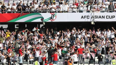 Jordanian fans cheer for their team during the Asian Cup clash between Jordan and Australia. AFP
