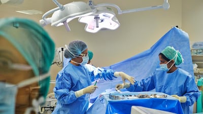 Female surgeons have reduced patient mortality rates compared to their male counterparts, a new study has found. Antonie Robertson / The National
