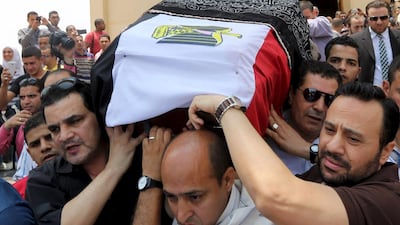 Mourners carry the coffin of Egyptian actor Omar Sharif during his funeral procession at the grand mosque of the Mushir Tantawi in Cairo, Egypt, July 12, 2015. Mohamed Abd El Ghany/Reuters
