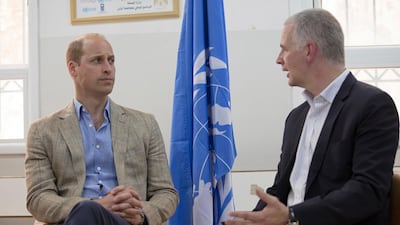 Britain's Prince William receives a briefing by Scott Anderson, the Director of UNRWA Operations in the West Bank, during a visit to a clinic operated by UNRWA inside Al-Jalzoun refugee camp near the West Bank city of Ramallah. Fadi Arouri / AP Photo