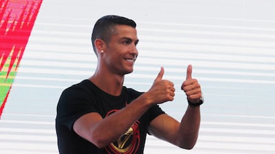 New Juventus football player Cristiano Ronaldo of Portugal greets fans during his visit to Beijing, China, on July 19, 2018. EPA