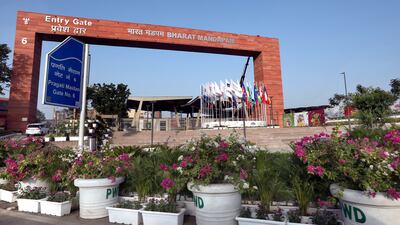 The flags of participating countries fly outside the Bharat Mandappam at ITPO Convention Centre, Pragati Maidan, the venue of the upcoming G20 summit in New Delhi on Monday. EPA