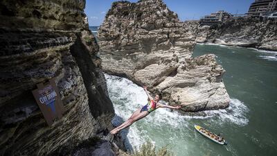 Yana Nestsiarava of Belarus dives from the 20m cliff in Raouche during the first competition day of the fifth stop of the Red Bull Cliff Diving World Series. Getty Images