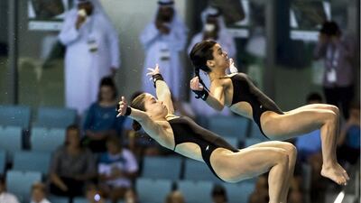 Two Chinese divers jump in unisn during day one of the Fina Diving World Series at Hamdan Sports Complex. Giorgio Scala / Deepbluemedia