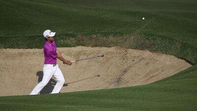 Jazz Janewattananond of Thailand in action during the final round of the Dubai Open at The Els Club Dubai on December 21, 2014 in Dubai, United Arab Emirates. (Photo by Francois Nel/Getty Images)