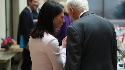 German Foreign Minister Annalena Baerbock, left, chats with Steny Hoyer, US representative for Maryland's 5th congressional district, prior to a meeting between German diplomats and a US congressional delegation at the 61st Munich Security Conference on February 14 in Munich. Getty Images