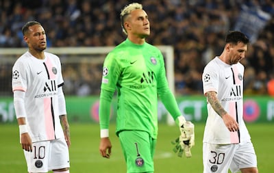 PSG's Lionel Messi, Neymar and Keylor Navas look dejected after the match against Club Brugge. Reuters