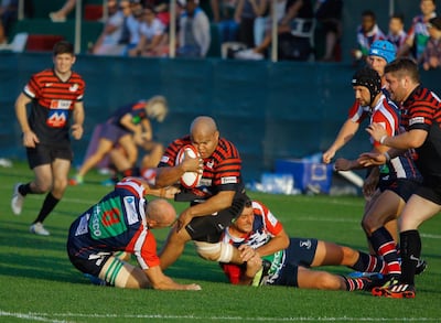 Gio Fourie, centre, in action for his former side Abu Dhabi Saracens, is eligible to play for the UAE. Victor Besa for The National