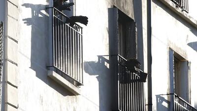 A French firefighter of Paris Fire Brigade (BSPP) inspects the apartment building. Charles Platiau / Reuters
