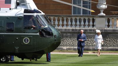Britain's Prince Charles and Camilla, Duchess of Cornwall wait next to Marine One as U.S. President Donald Trump and First Lady Melania Trump arrive at Buckingham Palace, in London, Britain, June 3, 2019. Reuters