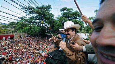 Ousted Honduran president, Manuel Zelaya, speaks to supporters at the Brazilian Embassy in Tegucigalpa on September 21, 2009.