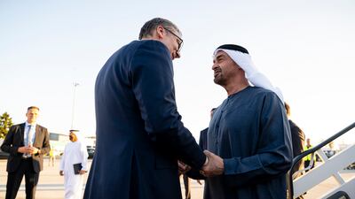 The two presidents shake hands in a warm welcome