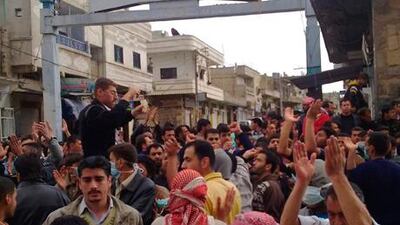 Protesters gather near the al Omari Mosque in the southern city of Deraa in this picture taken with a mobile phone.