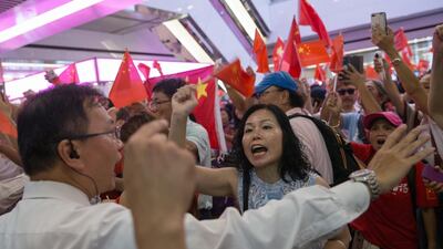 Shopping malls have become the latest hot spots in the city as large numbers of pro-China supporters and anti-government protesters come to blow as they try to out-sing and out-shout each other. EPA