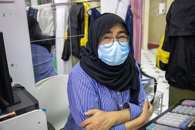 Store owner Asma has employed her nephew and her sister at her store to help them out financially. Photo: Larayb Abrar