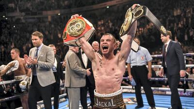 Carl Frampton celebrates defeating Scott Quigg on points in their IBF & WBA super-bantamweight world title fight in February, 2016. Getty
