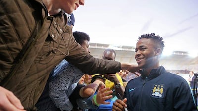 Raheem Sterling shown greeting fans upon joining new club Manchester City in Australia prior to their friendly against Melbourne City on Saturday. Jason O'Brien / Action Images / Reuters / July 18, 2015