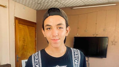 Hamza Al Ghazali, 18, from Gaza city ate chicken for the first time in six months after receiving a coupon from a charity. Photo: Mohammed Abu Doon