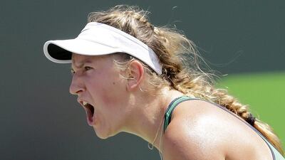 Victoria Azarenka, of Belarus, celebrates after winning a point against Svetlana Kuznetsova, of Russia, during the women's singles final match at the Miami Open tennis tournament in Key Biscayne, Fla., Saturday, April 2, 2016. Azarenka won 6-3, 6-2. (AP Photo/Alan Diaz)