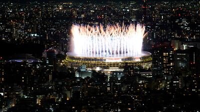 Fireworks illuminate over the National Stadium during the opening ceremony of 2020 Tokyo Olympics.
