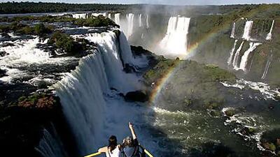 A view of the Iguazu waterfalls from the walkway extending from the Brazilian side of the Iguazu river.